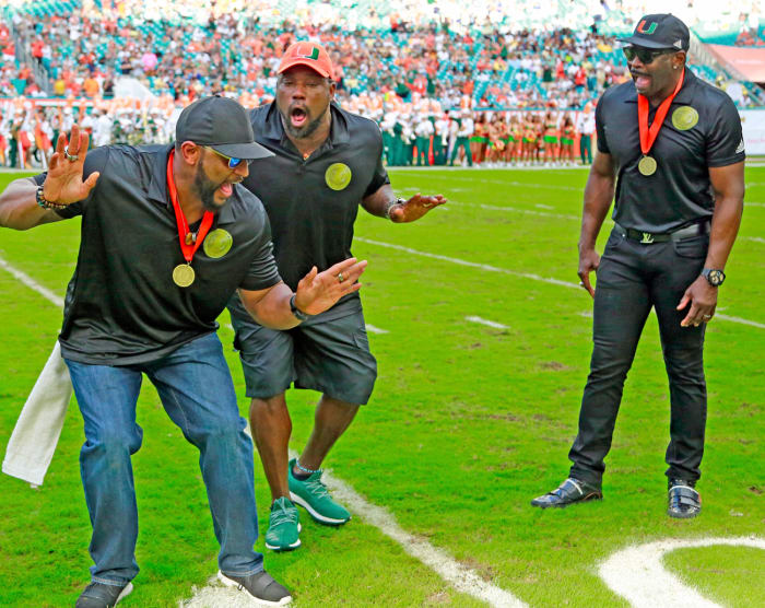 Sapp (center) with Ray Lewis and Michael Irvin at the October Ring of Honor ceremony.